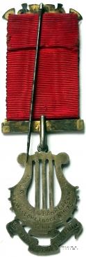 Знак за службу в качестве Городского Менестреля RAOB.