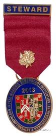 Знак RMBI 2013. STEWARD ROYAL MASONIC BENEVOLENT INST. – Королевский Масонский Благотворительный институт.